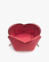 Open heart-shaped pouch viewed from the top showing interior and zipper.