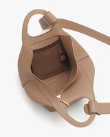 Open handbag with visible interior pocket and zipper.