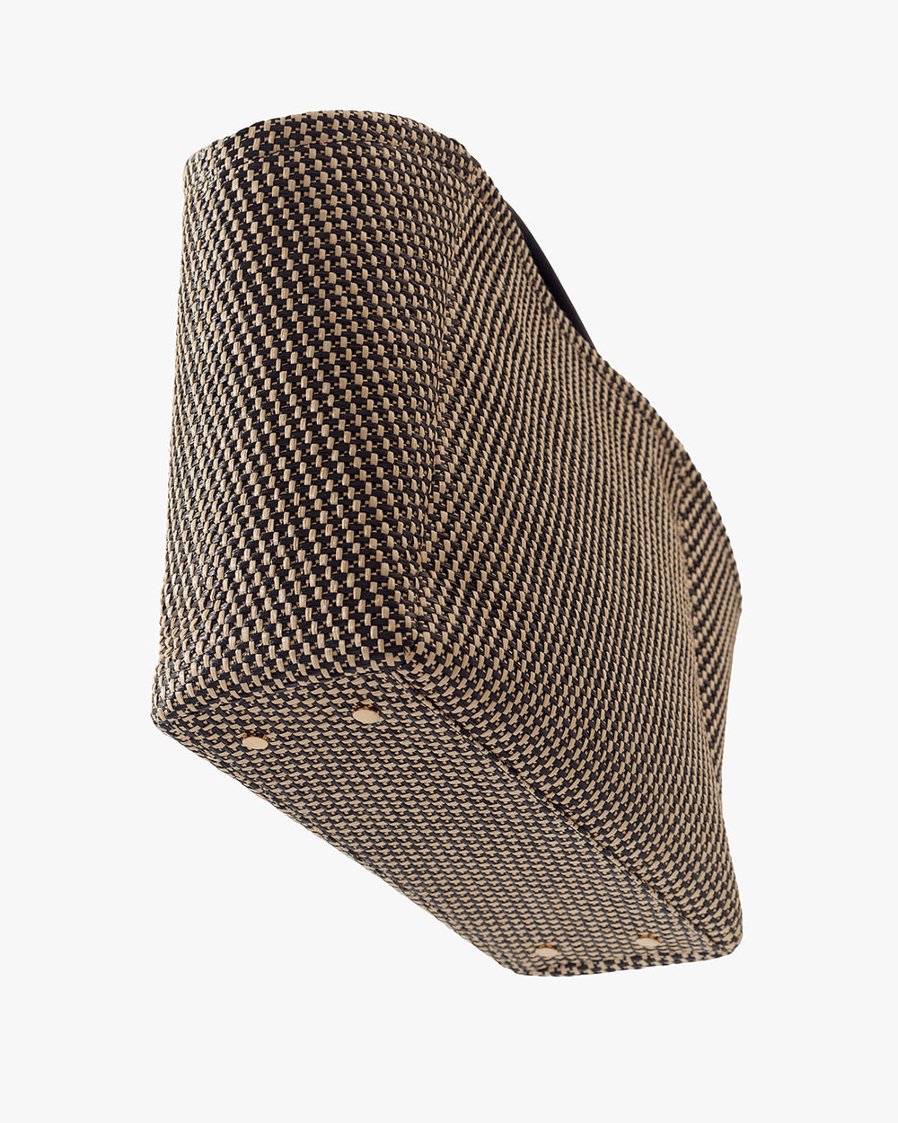 Palma Tote Textured travel bag with rounded sides shown from a low angle