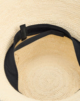 Inside view of a woven hat with inner lining strap.