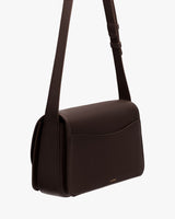 Rectangular shoulder bag with adjustable strap.