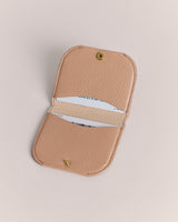 Open wallet with two visible card slots on a plain background.