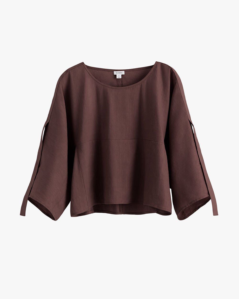 Loose-fitting, three quarter sleeve blouse with wide neckline.