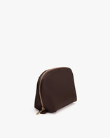 Rounded pouch with a zipper on top.