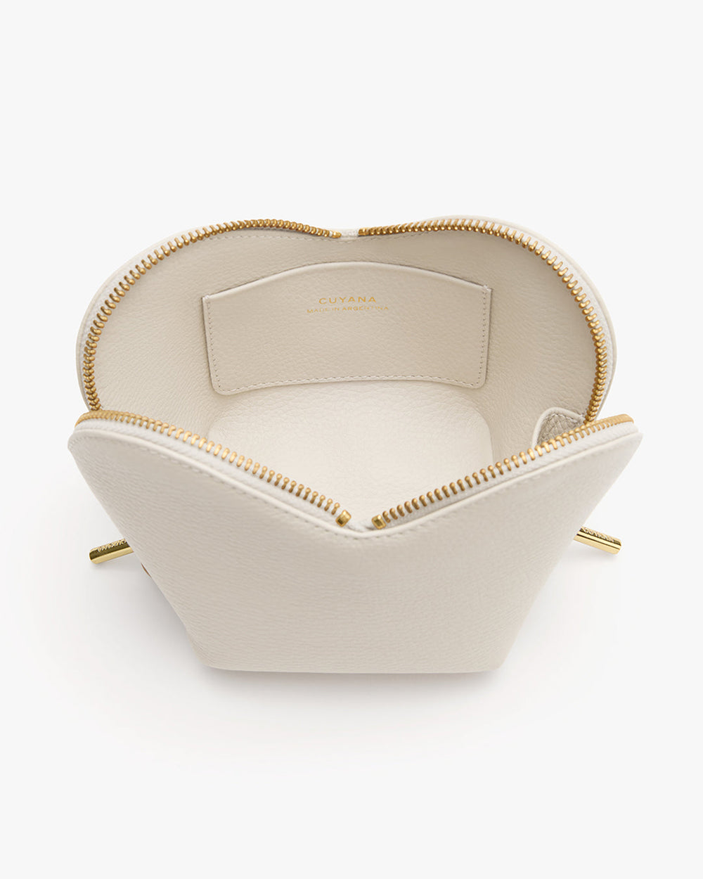 Open heart-shaped zipper pouch showing interior pocket