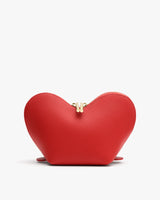 Heart-shaped pouch with a zipper on top.