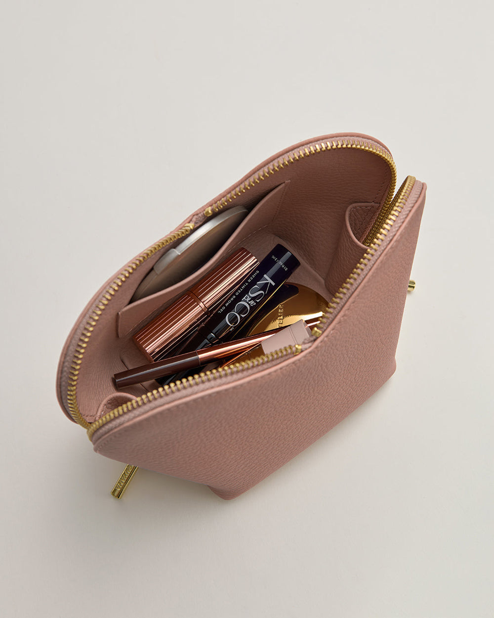 Mini Heart Case Open pouch with cosmetics and accessories inside