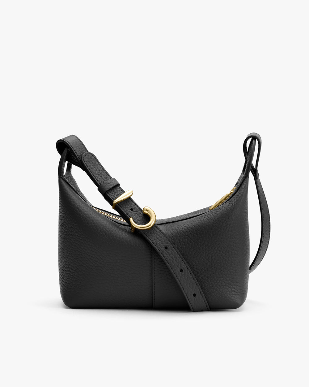 A small handbag with an adjustable strap and zipper closure.