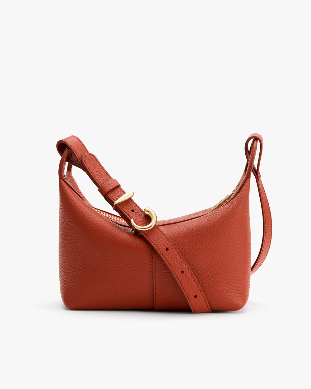 Shoulder bag with adjustable strap and curved shape