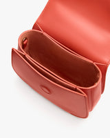 Open handbag with interior compartments visible