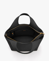 Open handbag with interior pocket and zip closure