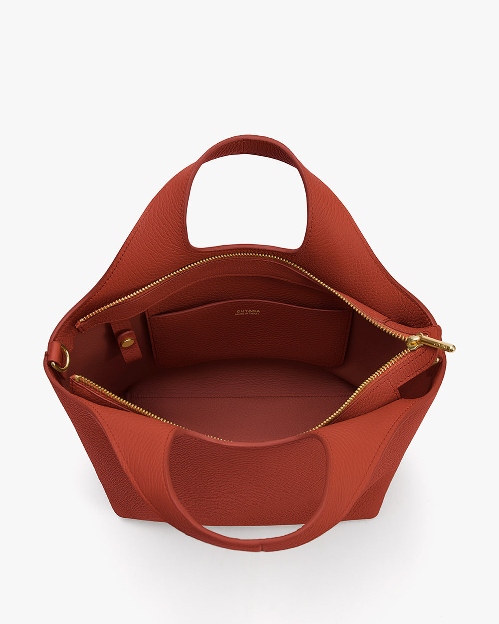 Open handbag with a zippered pouch inside and two handles.