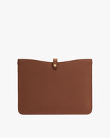 Rectangular pouch with a buttoned strap closure.