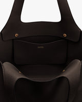 Open handbag with an inner pocket and snap buttons