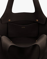 Open handbag with an inner pocket and snap buttons