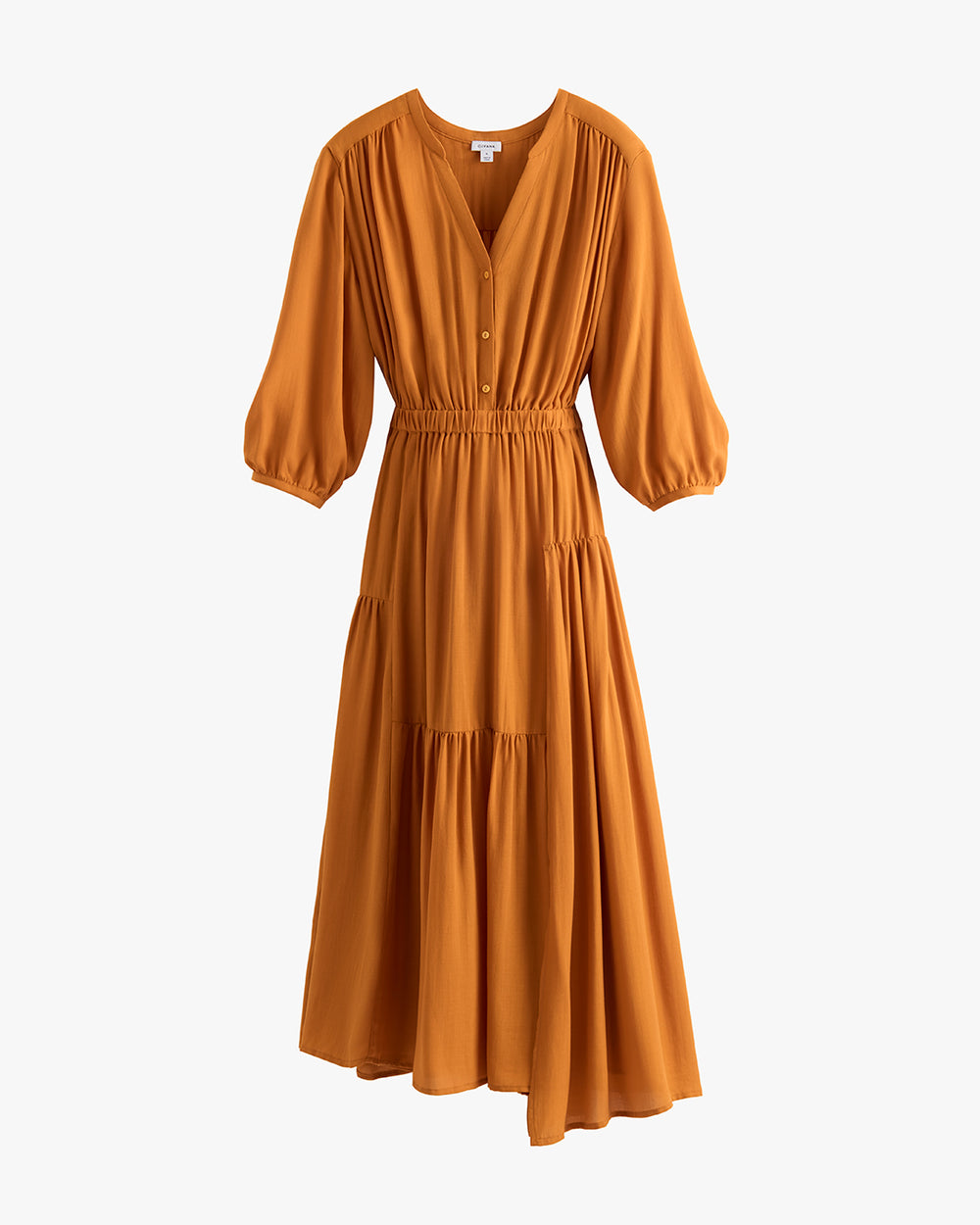 Long-sleeve buttoned dress with a gathered waist and tiered skirt displayed on a hanger.