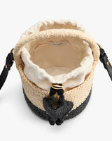 Woven bucket bag with an open top and shoulder straps.