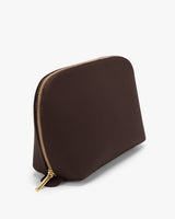 Leather zipper pouch shown on a plain background