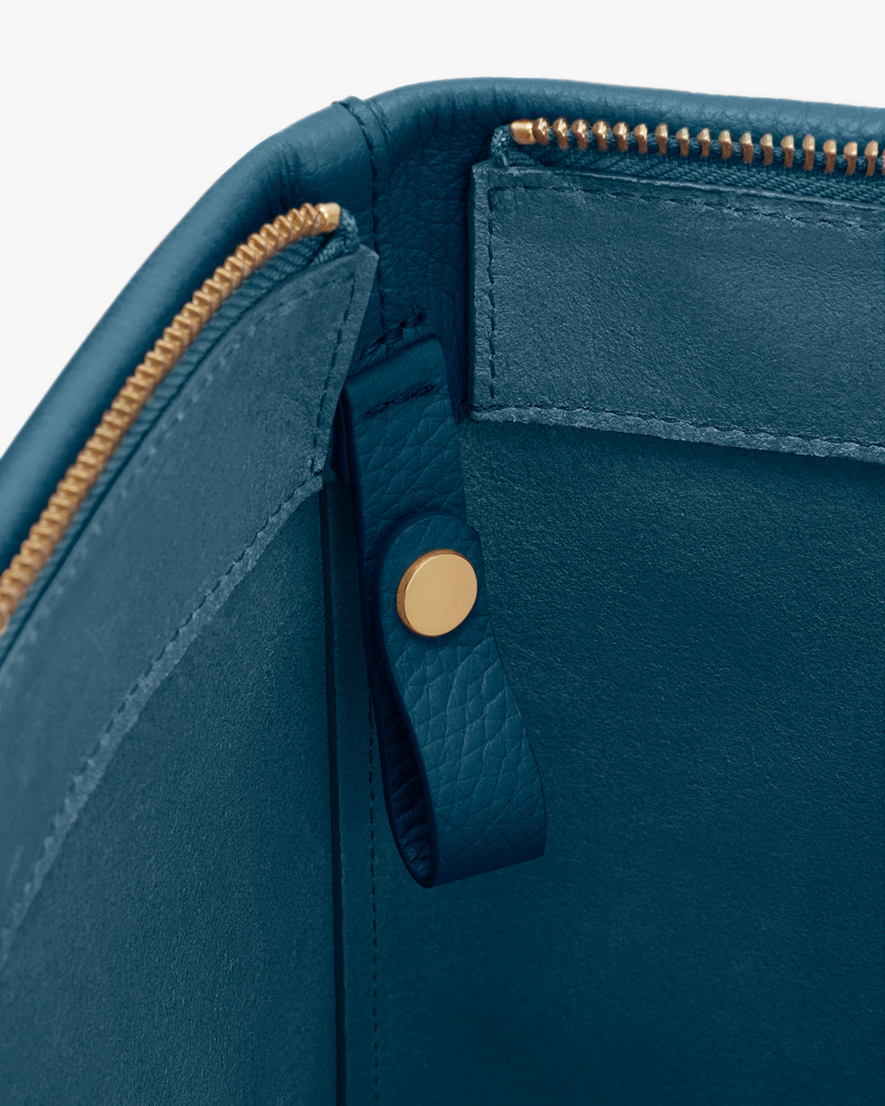 Tall Easy Zipper Tote Open leather bag with gold zipper and button detail inside.