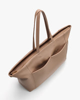 Large tote bag with two handles and exterior pockets