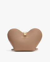 Heart-shaped handbag with a zipper on top.