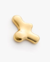 Shiny abstract gold-colored sculpture with rounded edges.