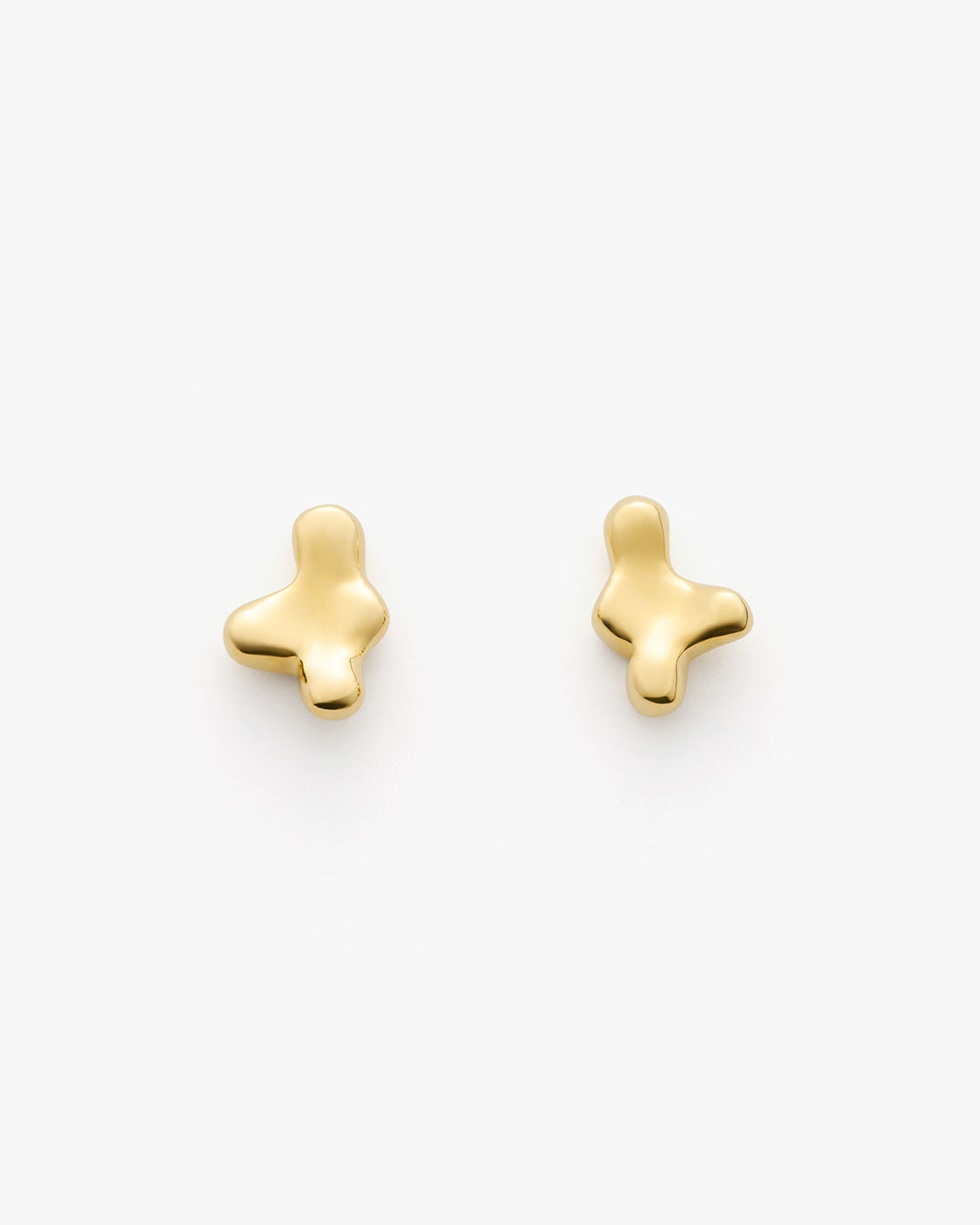 Two abstract-shaped stud earrings displayed on a plain background.