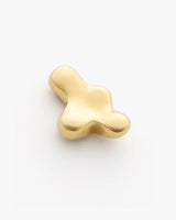 Abstract gold sculpture with a smooth, irregular shape.