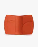 Open wallet with multiple card slots and a pocket inside.