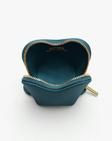 Small open pouch with a visible zipper and interior branding.