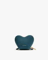 Heart-shaped coin purse with zipper on white background.