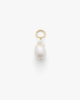 Pendant with a large irregular pearl and small loop on top.