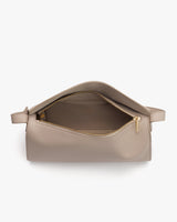 Open travel bag with a visible zipper and interior pocket