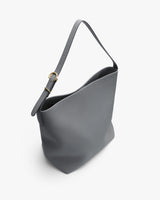 Shoulder bag with a single strap and metal buckle.