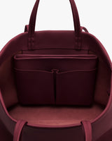 Open travel bag showing interior compartments and pockets