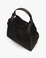 Open tote bag with curved handles and visible interior.