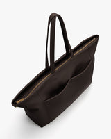 Tote bag with long handles and open top view.