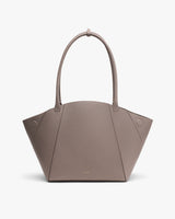 Tote bag with two handles and a geometric design.