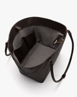 Open top shoulder bag with pockets and a spacious interior.