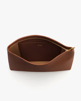 Open leather pouch with a visible zipper.