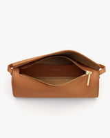 Open handbag with visible interior pocket and zipper.