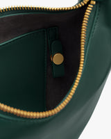 Open purse with a pocket and a button inside.