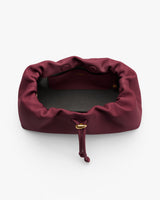 Open bag with drawstring and spacious interior.