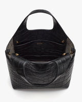 Tote bag with croc-embossed leather texture and open top design.