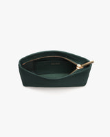 A small zippered pouch open, displaying the interior.