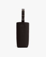 Tall bag with a wide strap and buckle, standing upright.