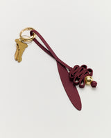 Keychain with decorative leather loop and attached keys