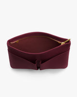 Open pouch with a zipper viewed from above.