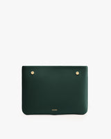 Rectangular clutch with small gold studs.