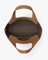 Open top view of a tote bag with wide handles and spacious interior.